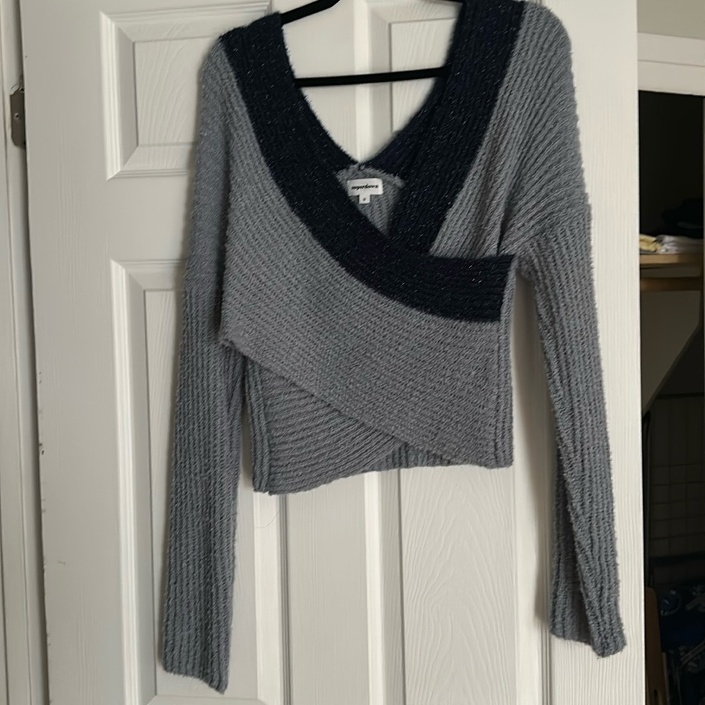 It’s a blue with navy sweater